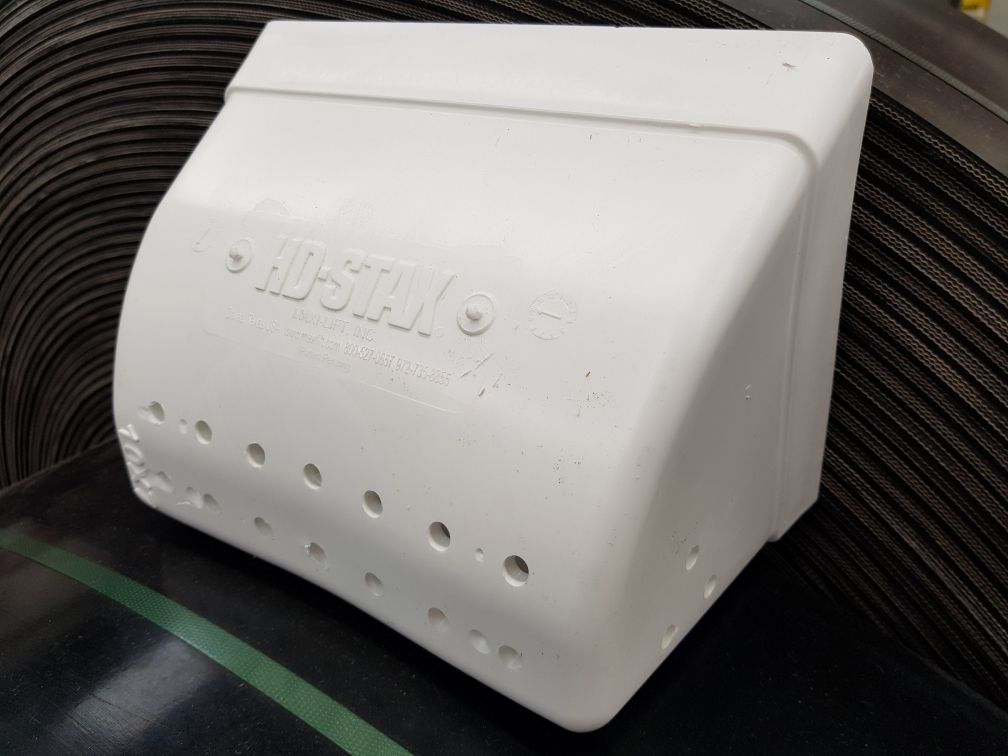 Elevatorbeker met ontluchtingsgaten.